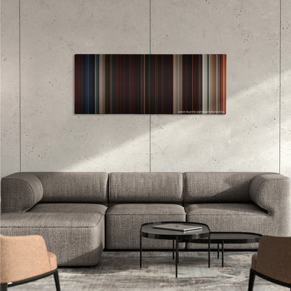 Beowulf color palette canvas on a concrete wall above a gray sectional sofa