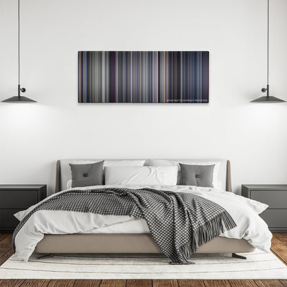Robocop 2 color palette canvas above a bed, between two black pendant lamps