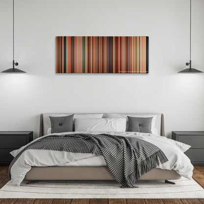 Machete color palette canvas above a bed, between two black pendant lamps