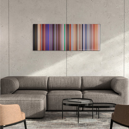 Cars 2 color palette canvas on a concrete wall above a gray sectional sofa