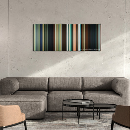 The Guard color palette canvas on a concrete wall above a gray sectional sofa