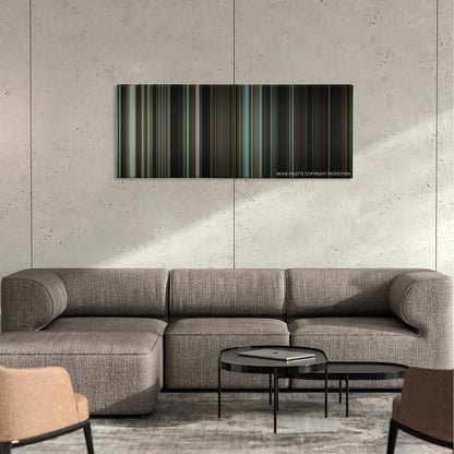 The Boy color palette canvas on a concrete wall above a gray sectional sofa
