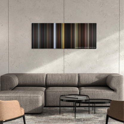 Angel Heart color palette canvas on a concrete wall above a gray sectional sofa