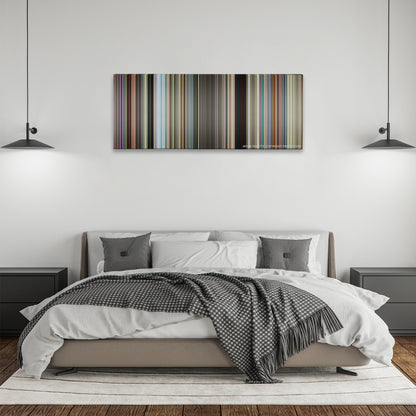 Ted 2 color palette canvas above a bed, between two black pendant lamps