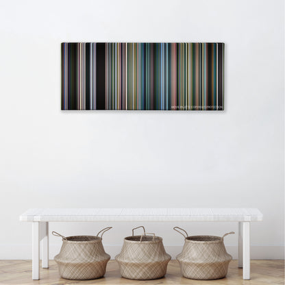 An Inconvenient Truth color palette canvas above a white bench with three woven baskets