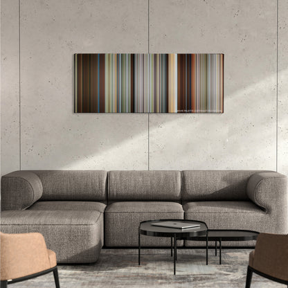 Need for Speed color palette canvas on a concrete wall above a gray sectional sofa