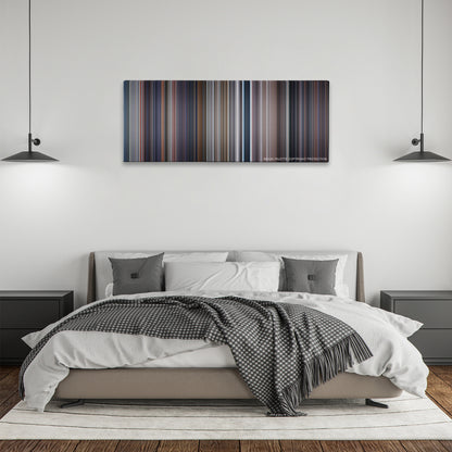 Tomorrow Never Dies color palette canvas above a bed, between two black pendant lamps