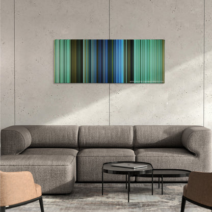 King Arthur color palette canvas on a concrete wall above a gray sectional sofa