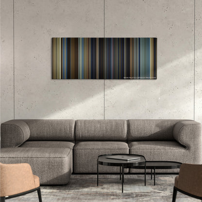 Exodus: Gods and Kings color palette canvas on a concrete wall above a gray sectional sofa