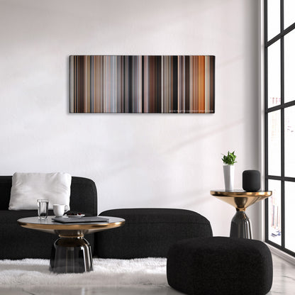 Quantum of Solace color palette canvas above a black sofa with a gold-topped table