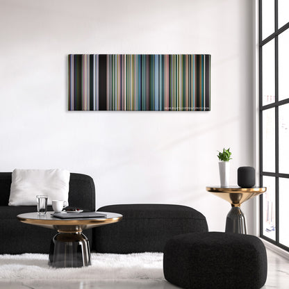 An Inconvenient Truth color palette canvas above a black sofa with a gold-topped table