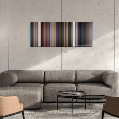 Rise of the Guardians color palette canvas on a concrete wall above a gray sectional sofa