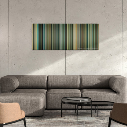 Transporter 3 color palette canvas on a concrete wall above a gray sectional sofa