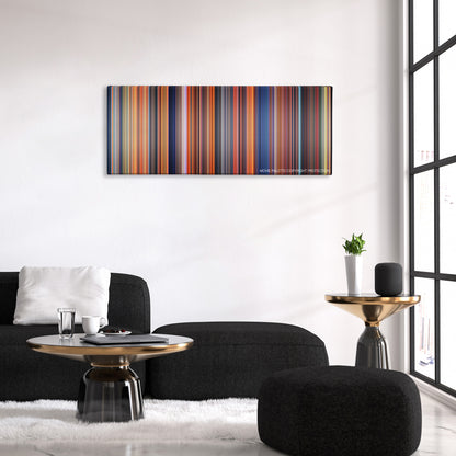 The Land Before Time color palette canvas above a black sofa with a gold-topped table
