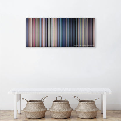 Jurassic Park color palette canvas above a white bench with three woven baskets