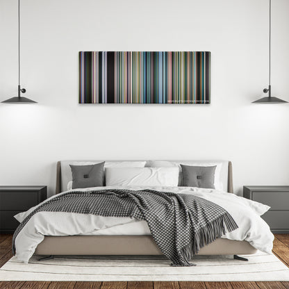 An Inconvenient Truth color palette canvas above a bed, between two black pendant lamps