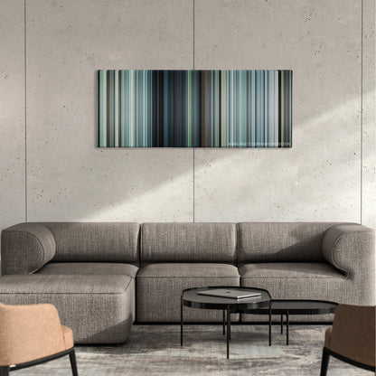 Angel Has Fallen color palette canvas on a concrete wall above a gray sectional sofa