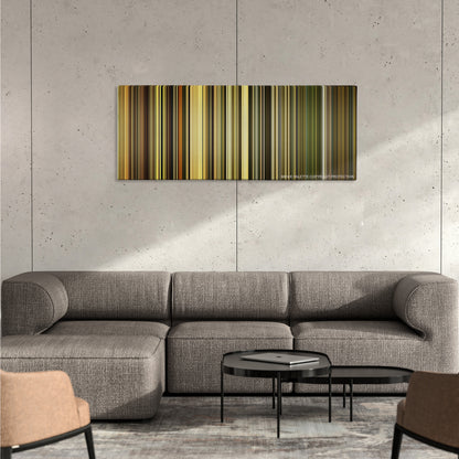 Dangal color palette canvas on a concrete wall above a gray sectional sofa