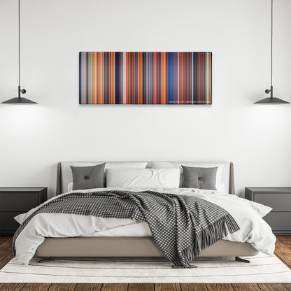 The Land Before Time color palette canvas above a bed, between two black pendant lamps