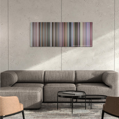 Blades of Glory color palette canvas on a concrete wall above a gray sectional sofa