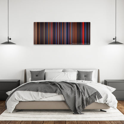 Flatliners color palette canvas above a bed, between two black pendant lamps