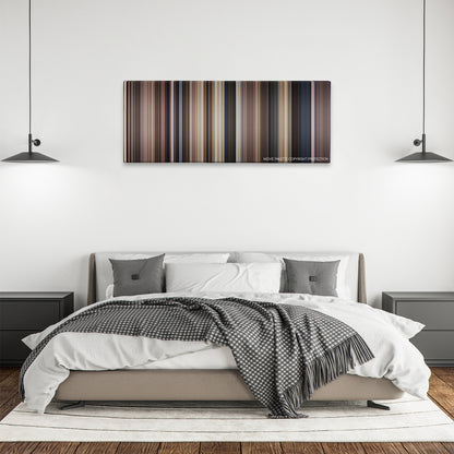 The Karate Kid Part II color palette canvas above a bed, between two black pendant lamps