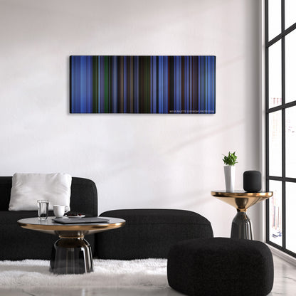 Saw color palette canvas above a black sofa with a gold-topped table