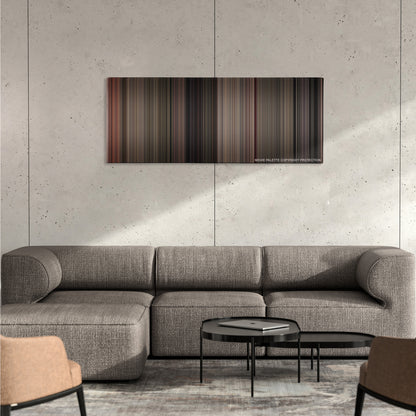 Dial M for Murder color palette canvas on a concrete wall above a gray sectional sofa