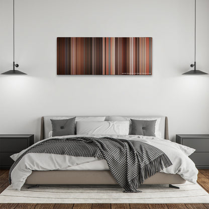 Desperado color palette canvas above a bed, between two black pendant lamps