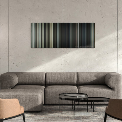 Letters from Iwo Jima color palette canvas on a concrete wall above a gray sectional sofa