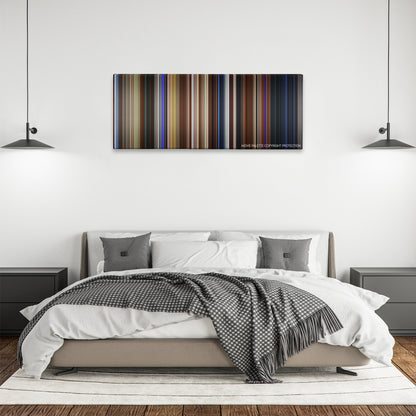 The Craft color palette canvas above a bed, between two black pendant lamps