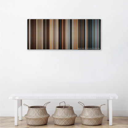 Los Idus de Marzo color palette canvas above a white bench with three woven baskets