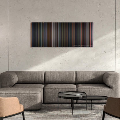 Final Fantasy: The Spirits Within color palette canvas on a concrete wall above a gray sectional sofa