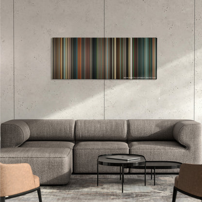 The Green Hornet color palette canvas on a concrete wall above a gray sectional sofa