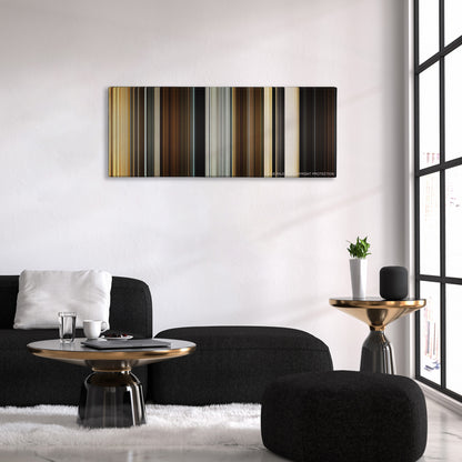 Spectre color palette canvas above a black sofa with a gold-topped table