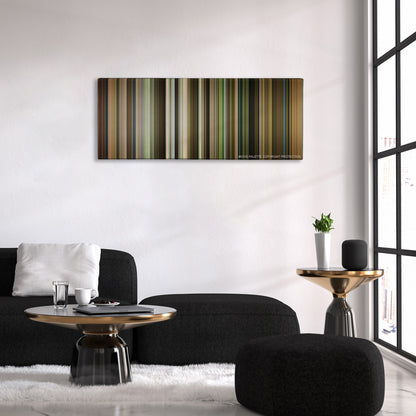 Green Book color palette canvas above a black sofa with a gold-topped table