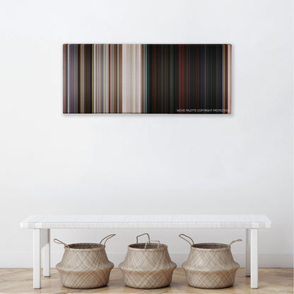No Escape color palette canvas above a white bench with three woven baskets