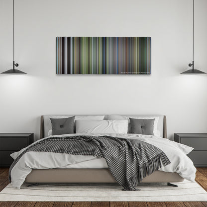 The Thin Red Line color palette canvas above a bed, between two black pendant lamps