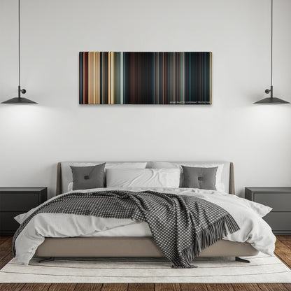 The Mummy color palette canvas above a bed, between two black pendant lamps