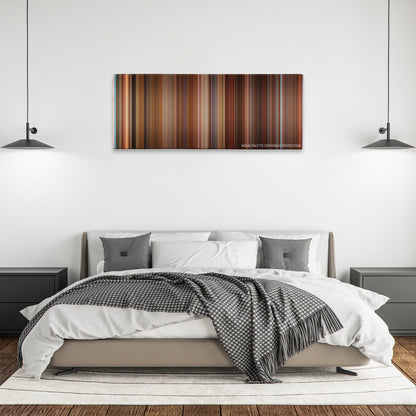 The House Bunny color palette canvas above a bed, between two black pendant lamps