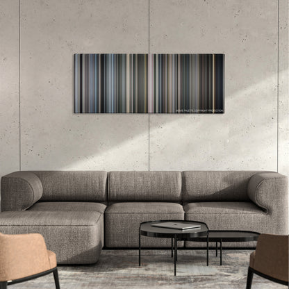 Case 39 color palette canvas on a concrete wall above a gray sectional sofa