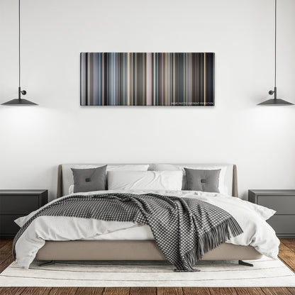 Case 39 color palette canvas above a bed, between two black pendant lamps
