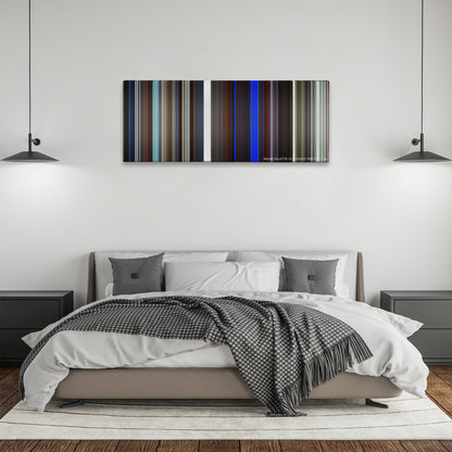 25th Hour color palette canvas above a bed, between two black pendant lamps