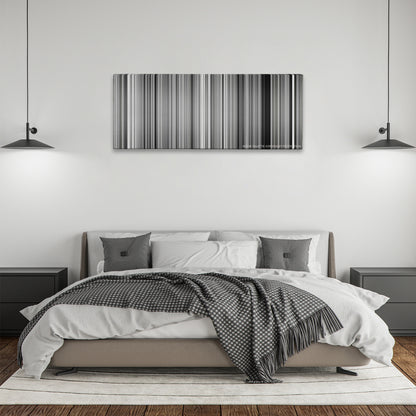 Pi color palette canvas above a bed, between two black pendant lamps
