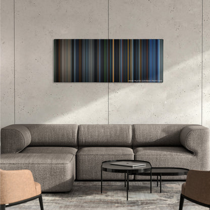 Fantastic Four color palette canvas on a concrete wall above a gray sectional sofa