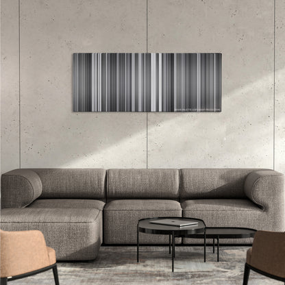 Rashomon color palette canvas on a concrete wall above a gray sectional sofa