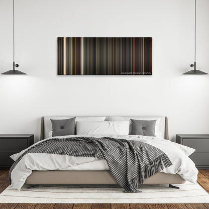 As Above, So Below color palette canvas above a bed, between two black pendant lamps