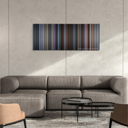 Wag The Dog color palette canvas on a concrete wall above a gray sectional sofa