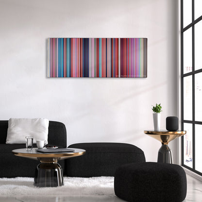 Despicable Me 2 color palette canvas above a black sofa with a gold-topped table