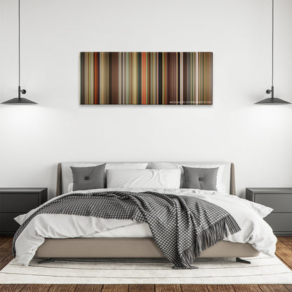 Semi-Pro color palette canvas above a bed, between two black pendant lamps